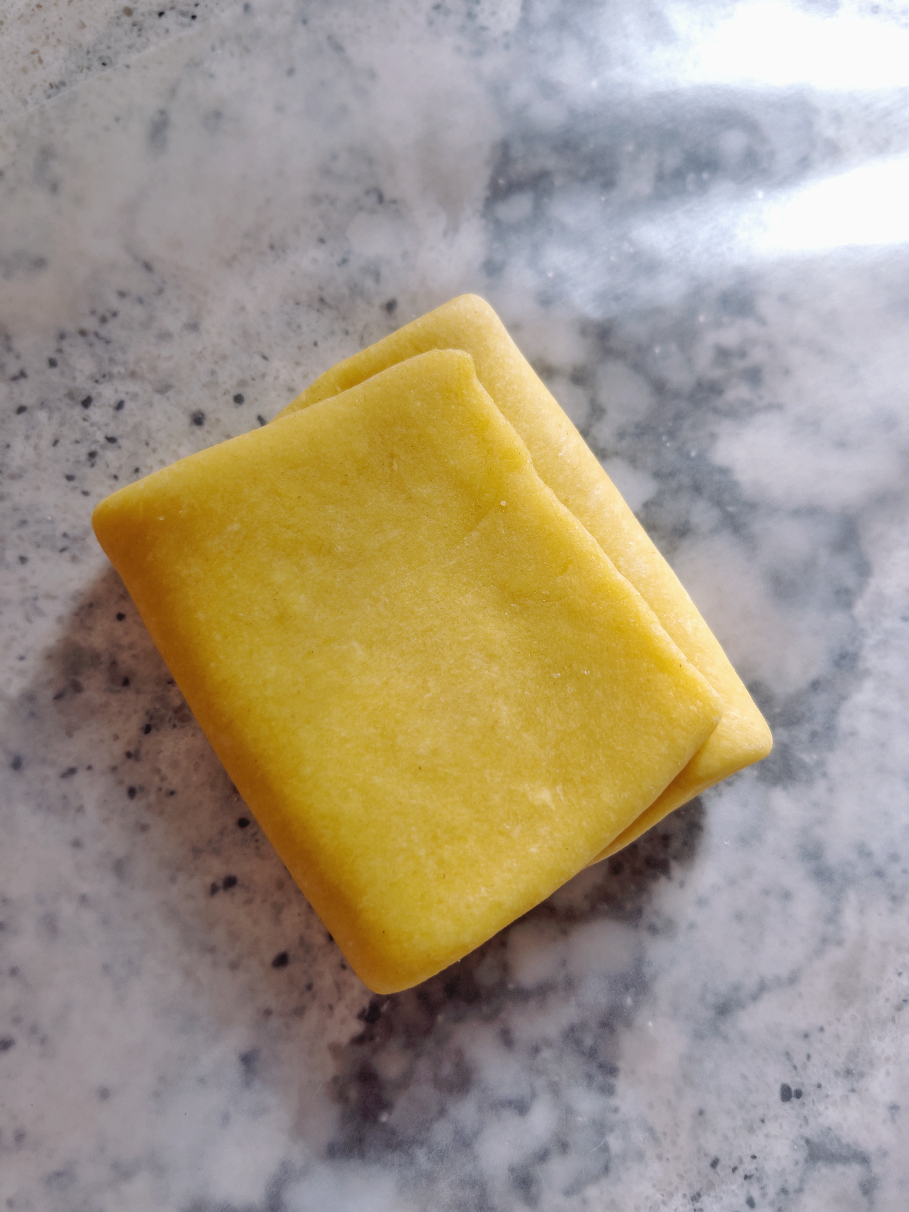 close up of folded pasta dough