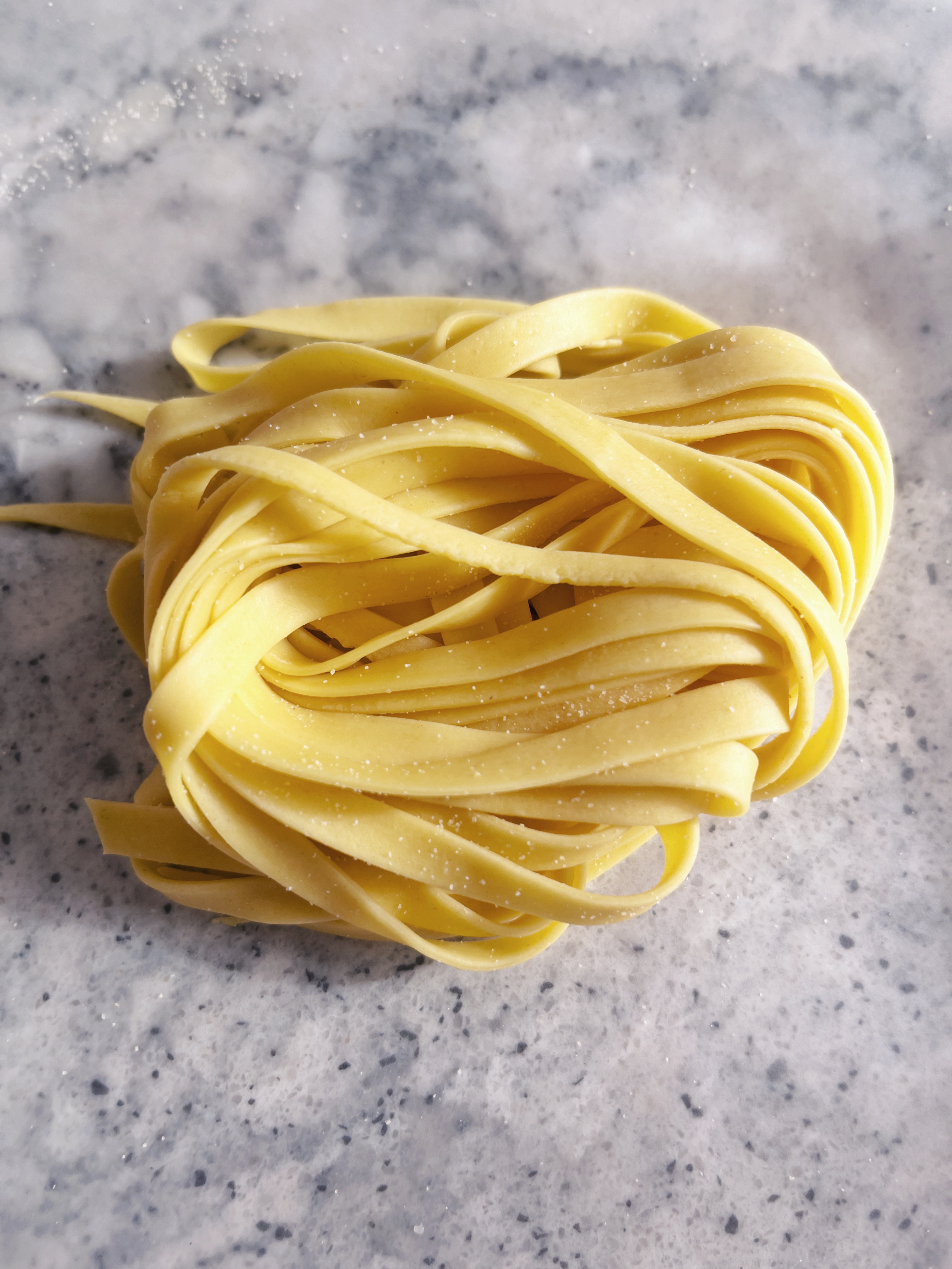 a portion of fresh fettuccine pasta